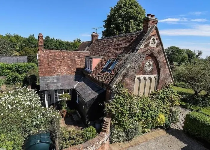 Old School House Surrounded By Countryside