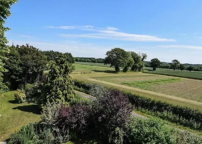Old School House Surrounded By Countryside