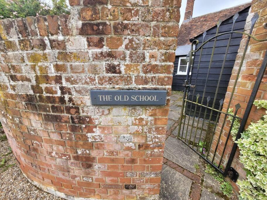 Old School House Surrounded By Countryside *