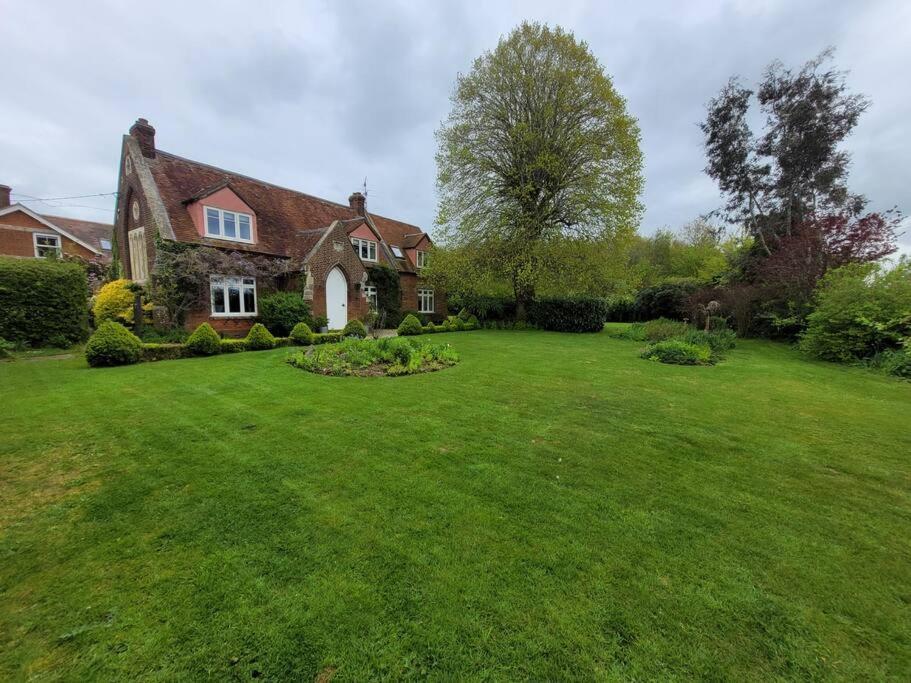 Old School House Surrounded By Countryside *